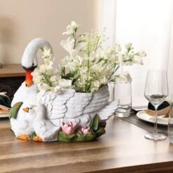 LuxenHome White Resin Swan Family Planter 17 LuxenHome White Resin Swan Family Planter -D'Eco Store GUEST 02f42aa8 435e 4606 8e6d 0985c2d42b52