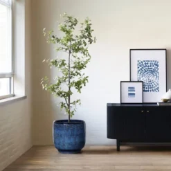 LuxenHome 12-Inch Ocean Blue Ceramic Planter Indoor Outdoor Plant Pot With Drainage Hole And Plug Modern Glazed Round Flower Pot Planter -D'Eco Store GUEST 136a9560 fd3e 4838 a516 c8ceb53ad624